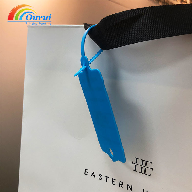 Blue plastic tamper proof seal tag, disposable zip tie security hang tag for luxury shopping bag anti-theft marking.jpeg