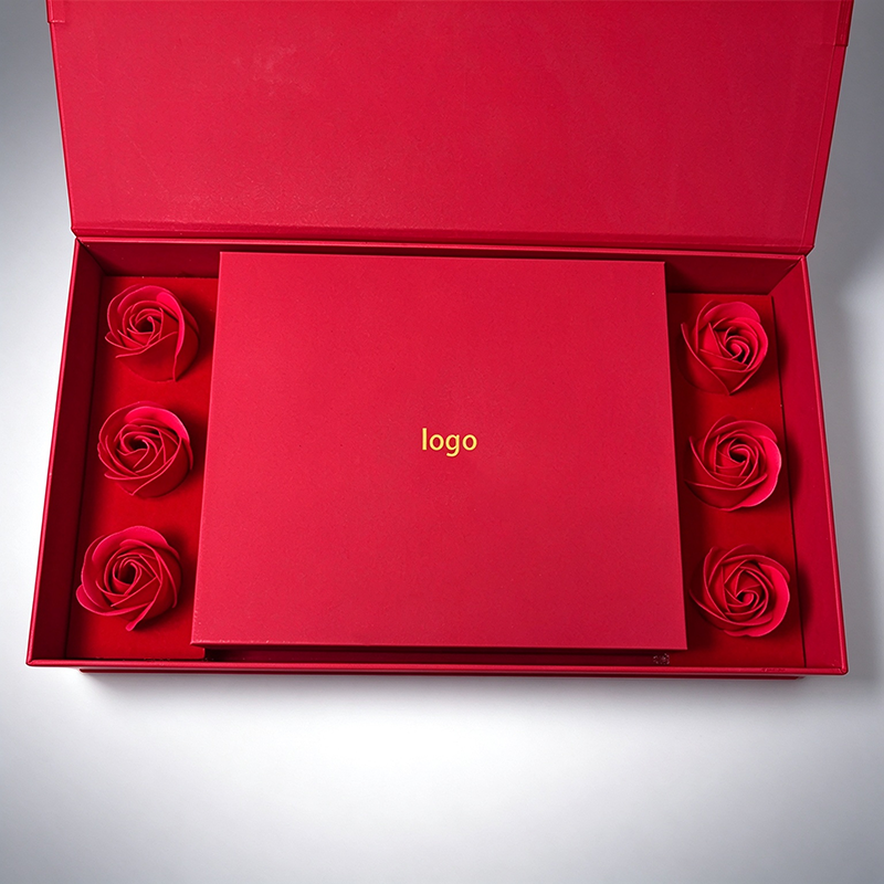 Open red magnetic gift box with 6 artificial soap roses and inner small gift box, romantic luxury packaging box for valentine gifts.png