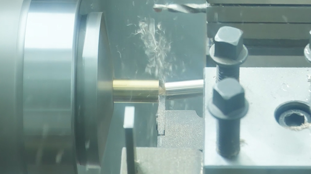 High-precision automated machines are manufacturing lock cores.