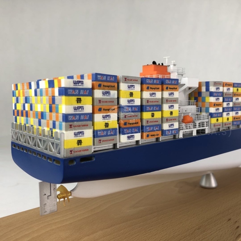 Unveil a 65cm Shipping Container Ship Model, a remarkable cargo shipment replica, perfect as a shipping-themed gift. Expertly crafted by O.A.S, this detailed masterpiece is delivered with care via DHL, embodying the essence of maritime prowess.Amber@vesselmodel.com Tel:+86 18038048785 65cm Shipping container ship model cargo shipment ship model