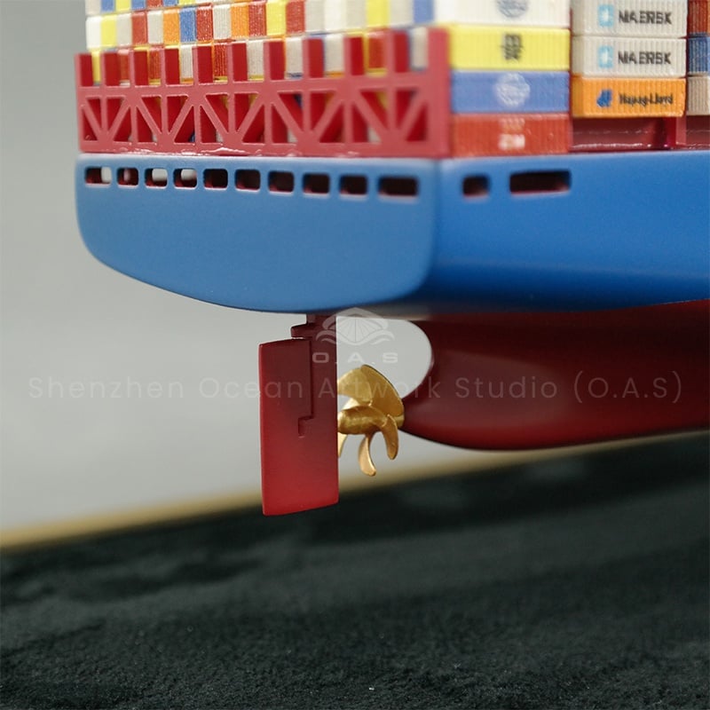 O.A.S Ship Model Customization factory focuses on creating 65cm static container ship models, which are the best choice for corporate customized gifts. The factory carved with exquisite craftsmanship, from the ship structure to the texture of the container, are accurately restored. It can be integrated into the enterprise elements, customize the exclusive ship model for the enterprise, and show the style as a gift to convey the corporate image.Amber@vesselmodel.com Tel: +86 18038048785