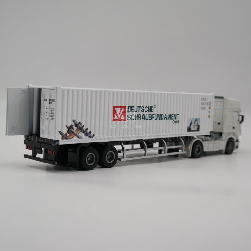 O.A.S factory focuses on creating 1:50 logistics alloy container truck model, based on Iveco collection card as the prototype, using high-quality alloy materials and fine craft carving, smooth body lines, accurate restoration of container structure. Support logo customization, can skillfully integrate the enterprise logo into the body and container, so that the model becomes a unique carrier for brand image display. Amber@vesselmodel.com Tel: +86 18038048785