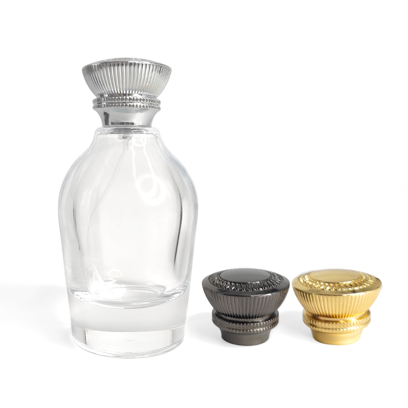 Sprzedaż hurtowa szklana butelka 100 ml butelka perfum Retro modelowanie z FEA 15 mm zaciskowy rozpylacz srebrny złoty pokrowiec na perfumy z Zamac