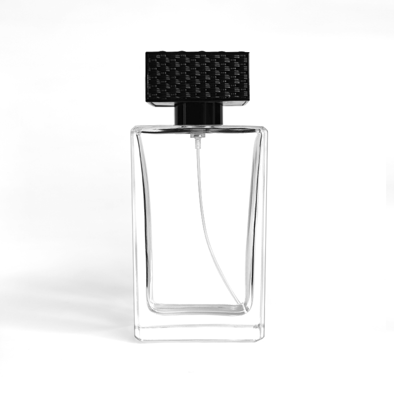 Muestra gratuita, alta calidad, baja cantidad mínima de pedido, botella de perfume rizada de vidrio transparente biodegradable de 50 ml, 80 ml y 100 ml con spray, venta al por mayor