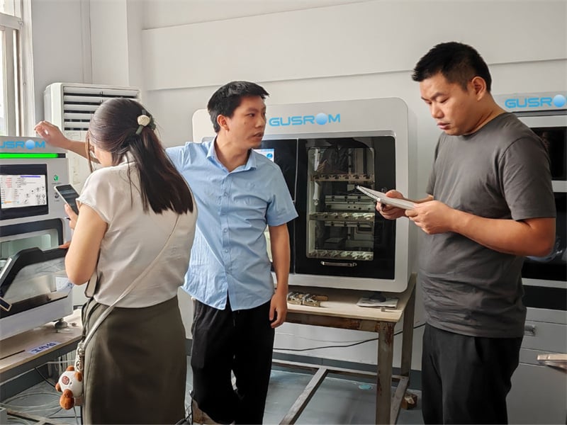 Gusrom staffs in dental machine operation training.jpg