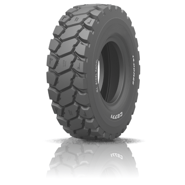 How do off-road tires ensure traction on uneven construction terrain?