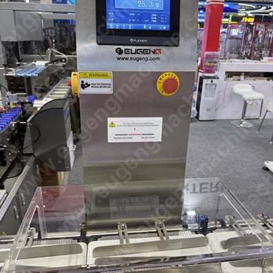 Full automatic lip gloss filling,capping,weighing,labeling & cartoning machine11.JPG