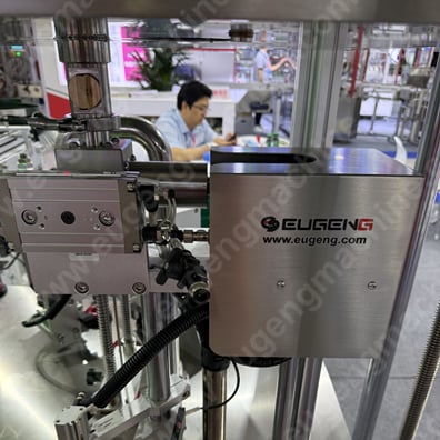 Full automatic lip gloss filling,capping,weighing,labeling & cartoning machine1415.jpg