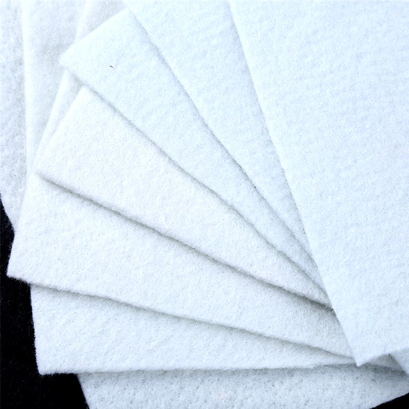Geotechnical cloth for stabilizing soil in road construction