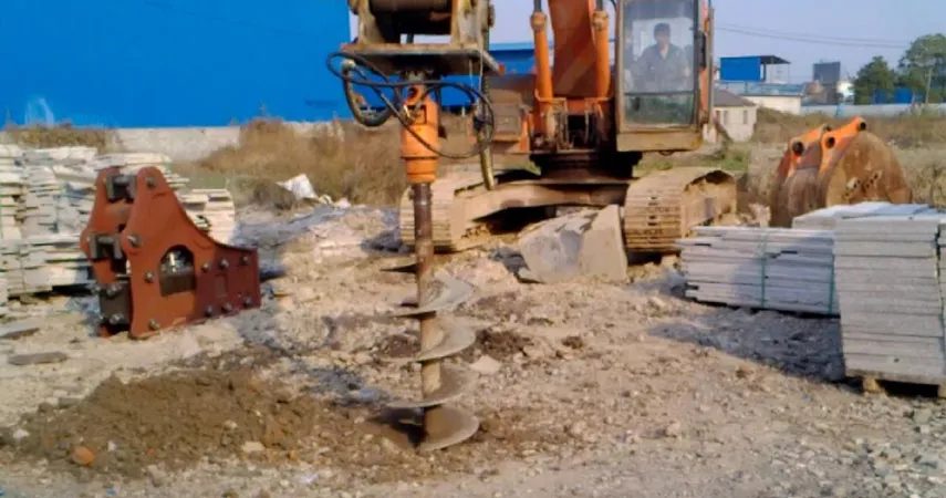 Auger assisted piling of farm house foundation