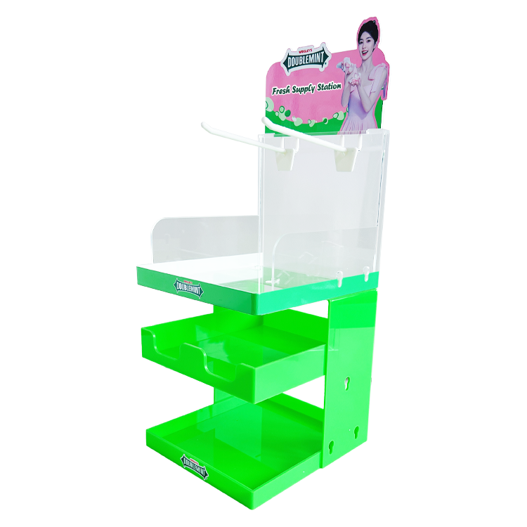 Standalone acrylic retail candy display for assorted mints and small snacks.png