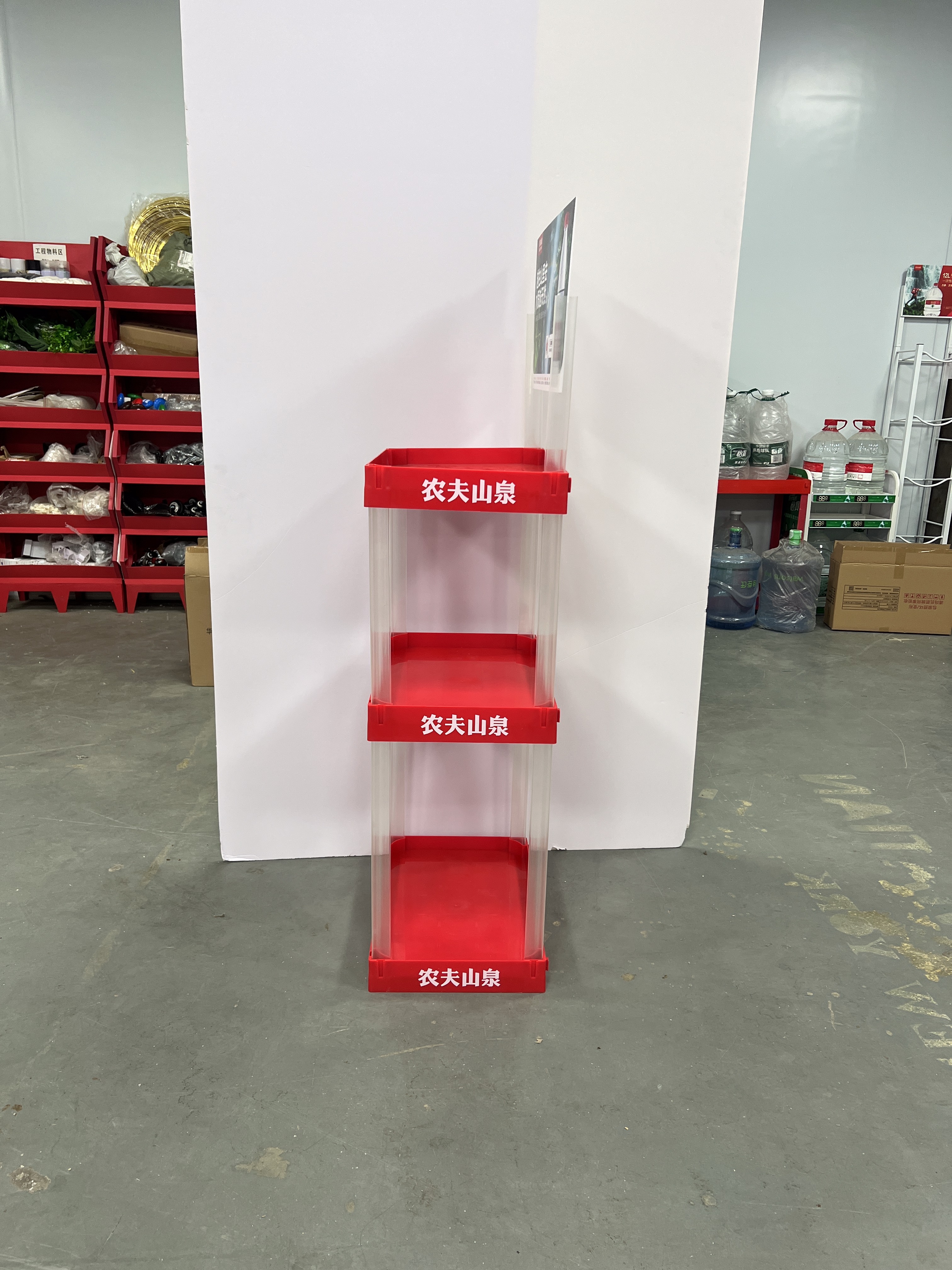 How does material choice affect plastic display stands?