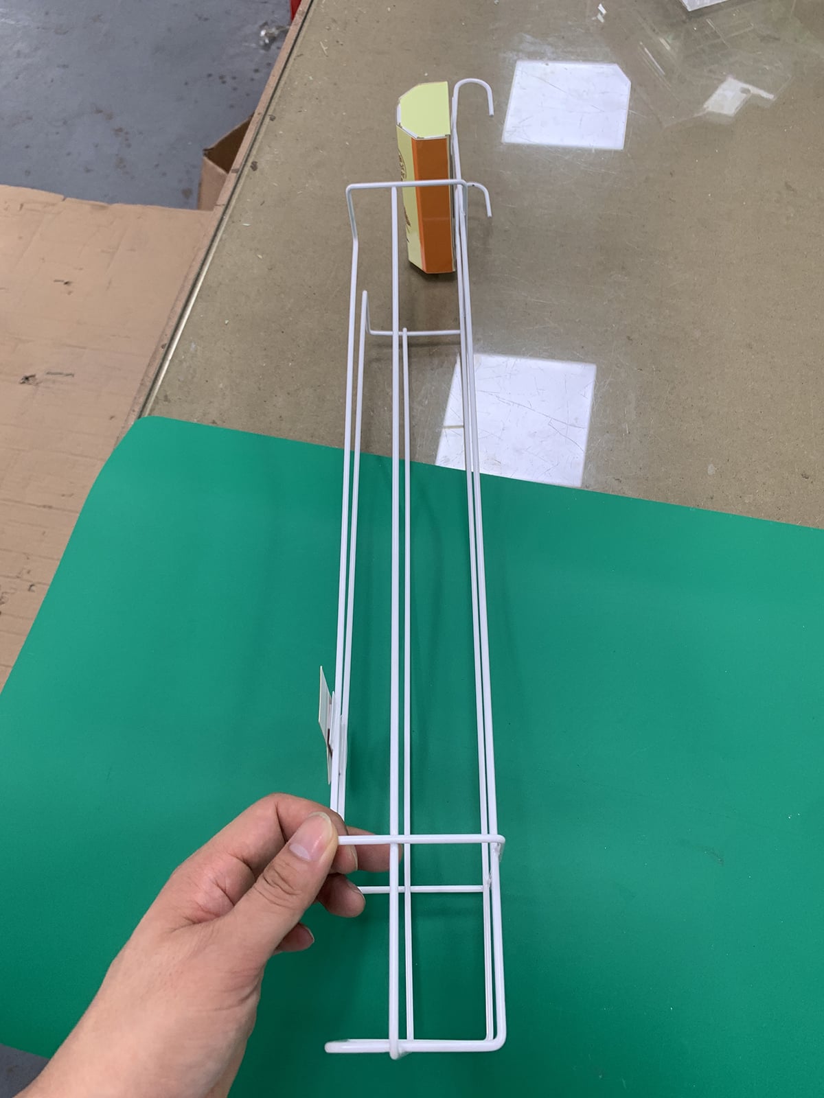 Metal vs Wood: Choosing Your Hanging Display Stand
