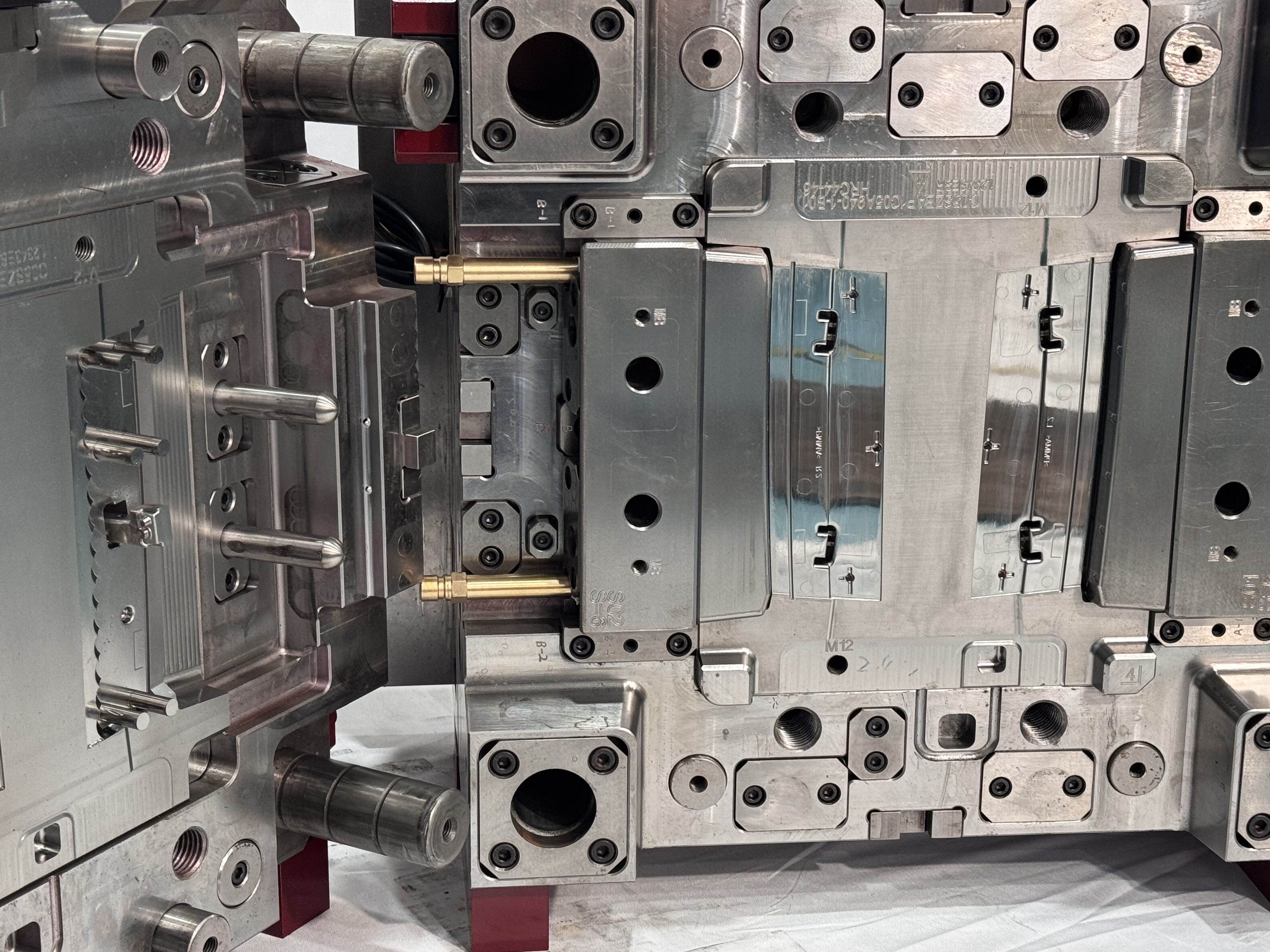 How does an injection mold maker support custom design requirements?