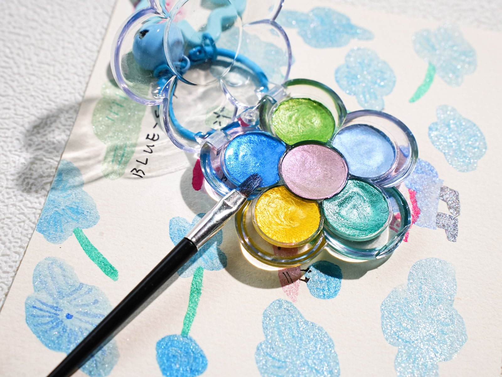 Open Miniature Flower Palette Displaying Six High Luster Shimmer Watercolor Pans
