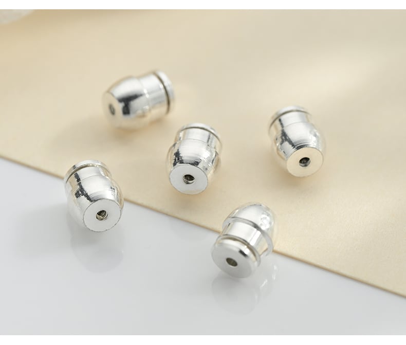 Copper flat head bullet earring backs product showcase.jpg