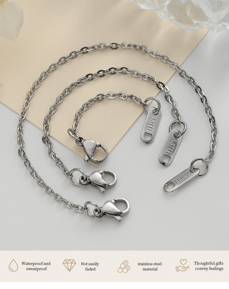 Extension chain with lobster clasp and engraved S.STEEL tag.jpg