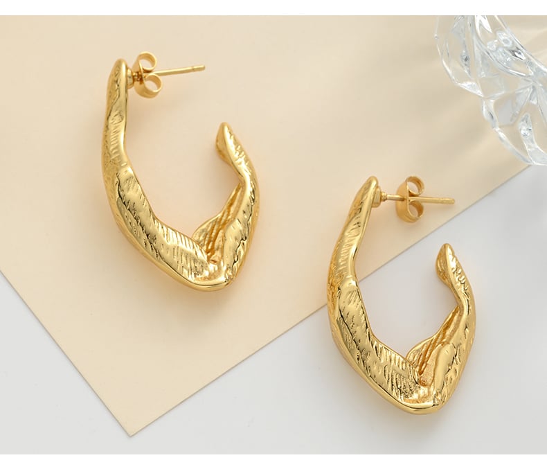 Product view of gold geometric hollow stud earrings.jpg