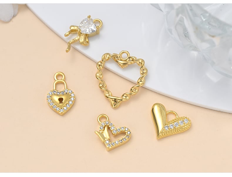 Gold plated CZ pendant charms product showcase.jpg