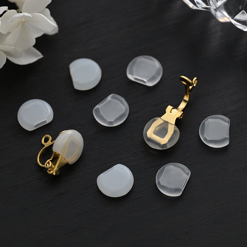 Silicone ear clip pain pads material close up.jpg