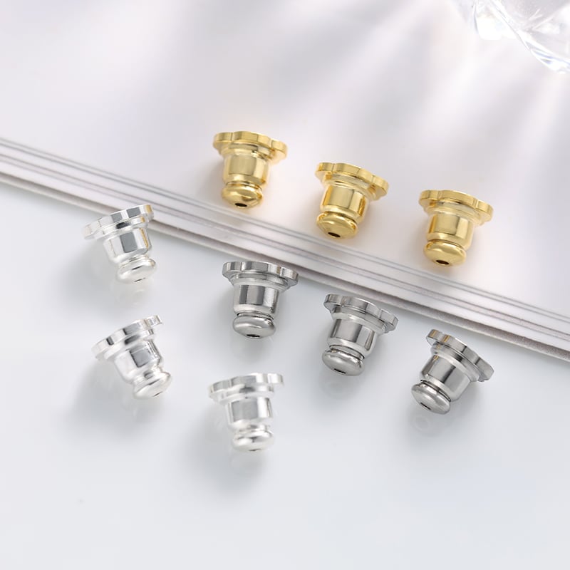 Flower earring backs collection display.jpg