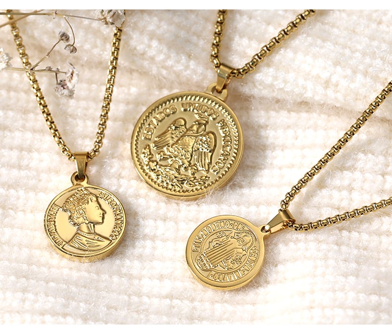 Custom gold coin pendant necklace with box chain, close-up on fabric.jpg