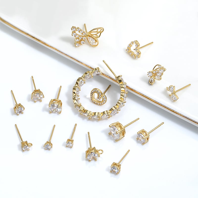 Mini CZ stud earrings worn in daily styling.jpg