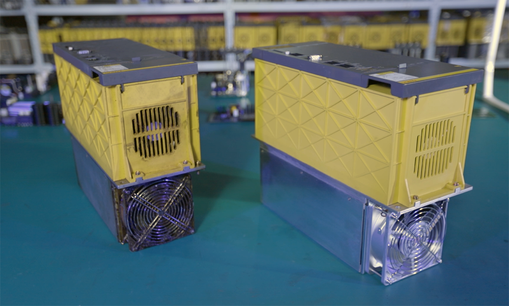 ABB robot drive units (DSQC 663 / 664) side by side on the bench — condition check before robot drive unit repair