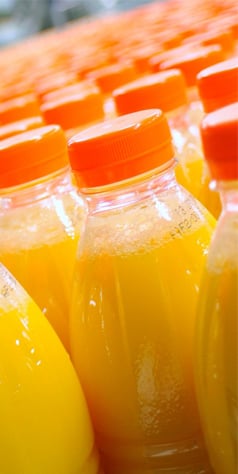Línea de llenado en caliente de jugos – Máquina de embotellado de jugo de naranja en botellas de PET