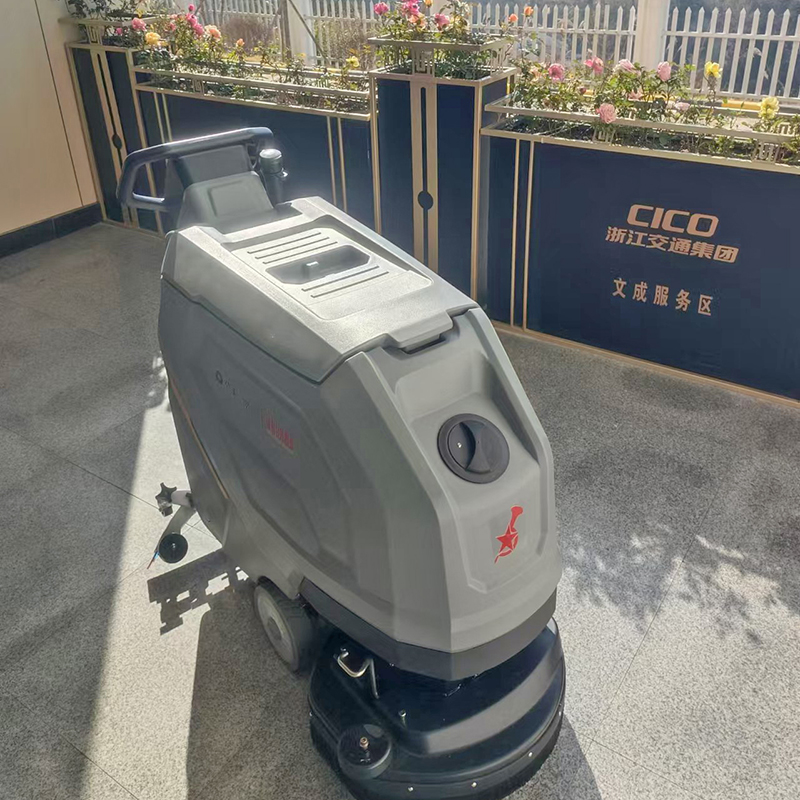 Versatile cleaning solutions with a walk behind scrubber