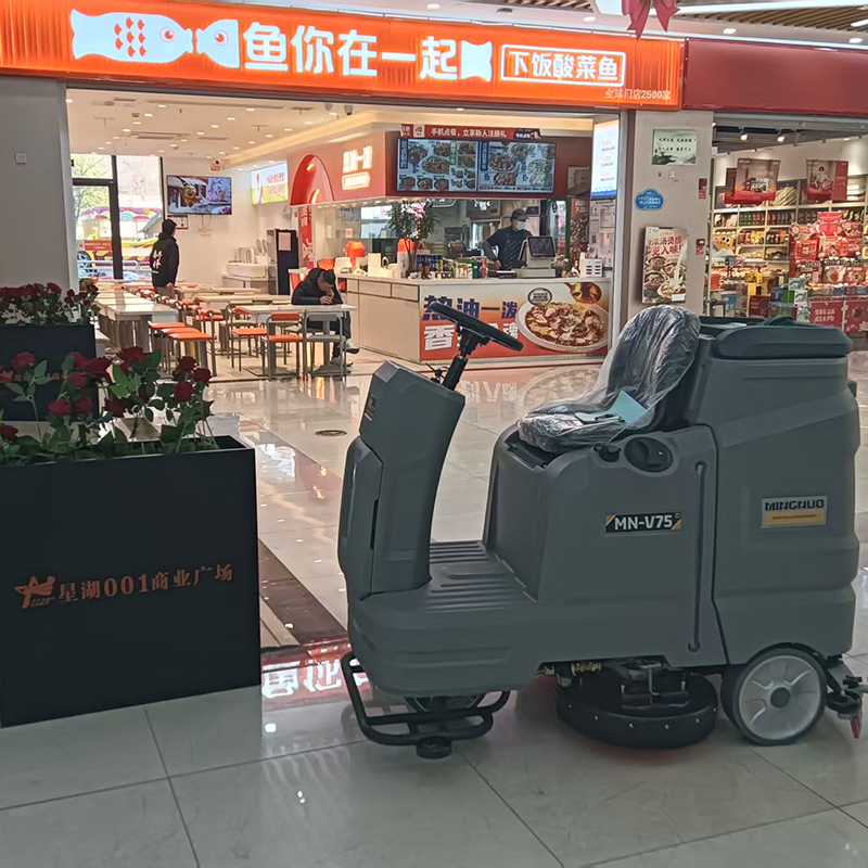 Say goodbye to manual scrubbing with an industrial floor scrubber machine