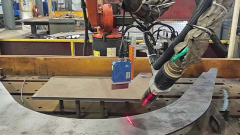 How does the laser weld tracking system integrate with existing welding equipment