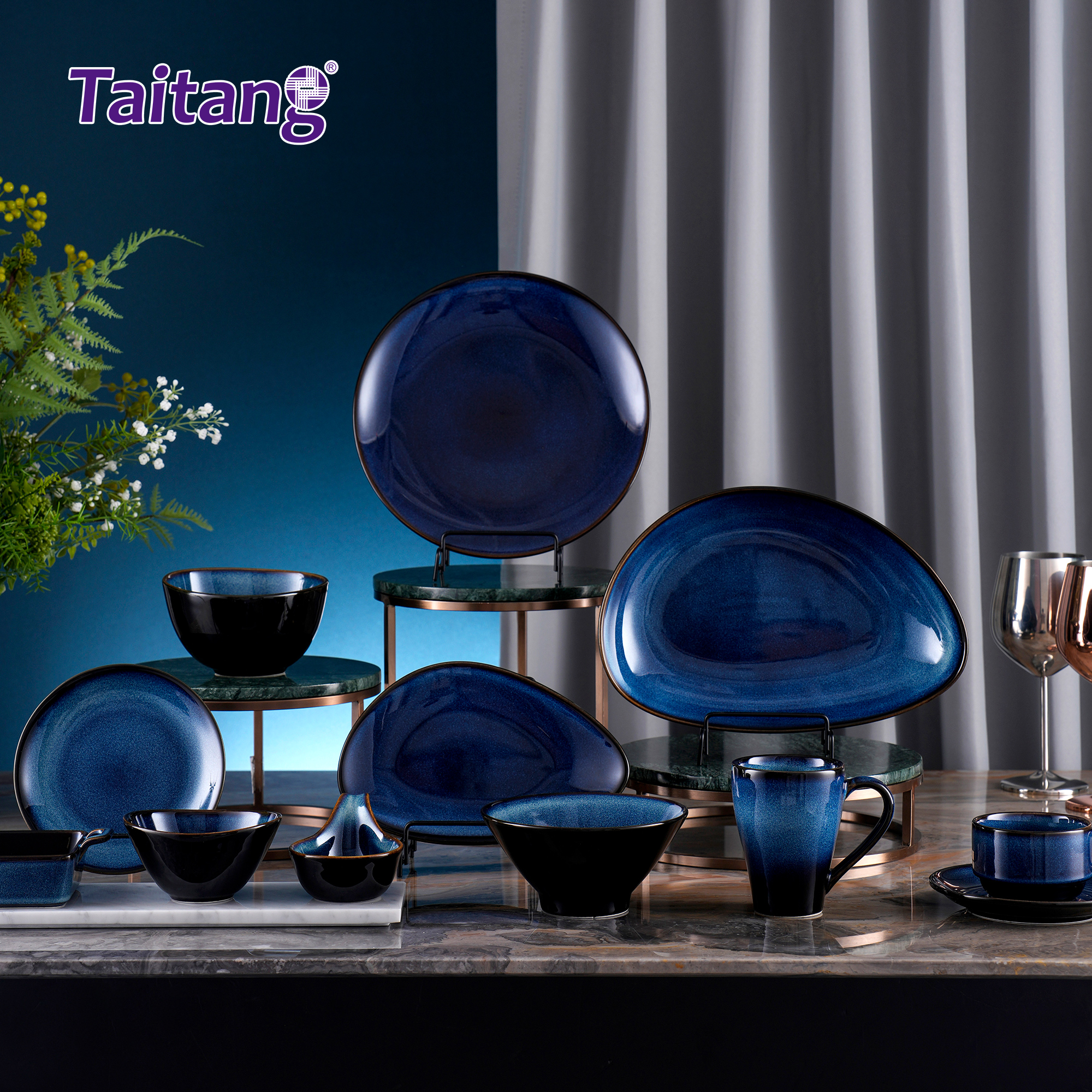3. Premium Taitang modern dinnerware sets in cosmic blue showcased on multi-tier display stands for luxury hotel table setting.jpg
