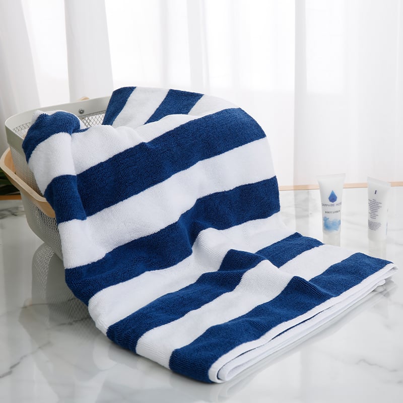 Nautical Striped Towel with Hotel Amenities on Marble Counter - Luxury Hotel Supplies.jpg