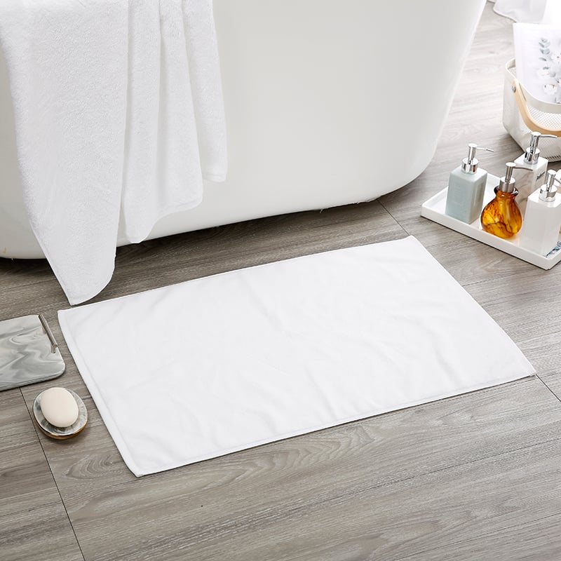 Taitang 50x80cm white cotton bath mat in a luxury hotel tub setting..JPG