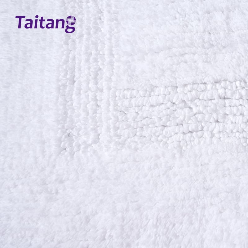 Oq mehmonxona bath mat va spa bath rug 1100 g og'irlikdagi mo'tabar paxta, elegan chegarali dizayn bilan