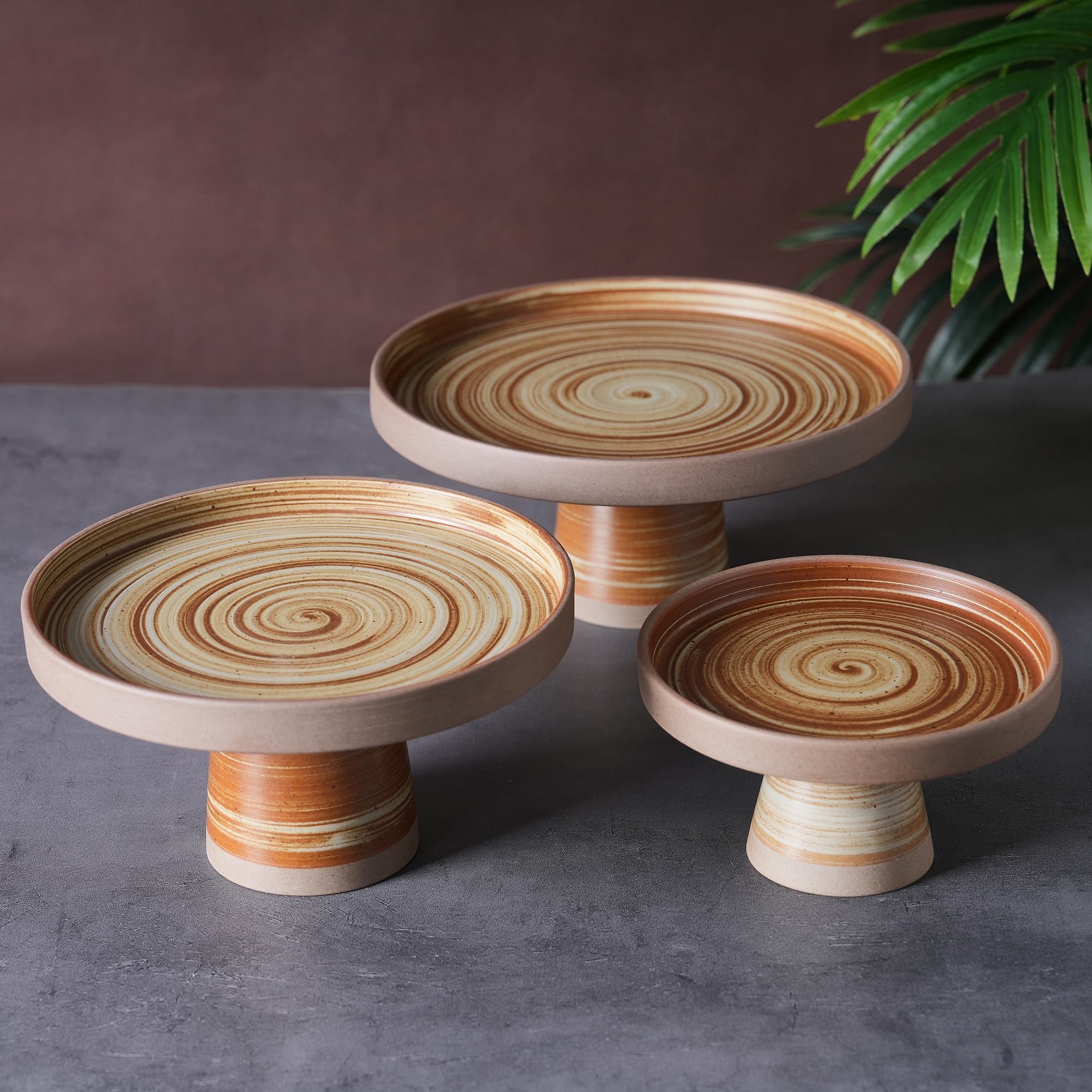 Taitang footed ceramic glazed presentation stands and pedestal fruit platters with spiral textures for premium resort buffet catering.jpg