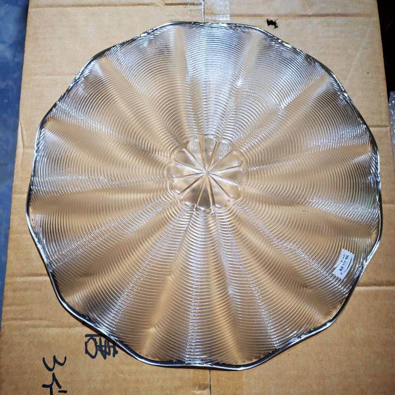 Clear glass serving platter with scalloped rim and radial textured pattern inspected for commercial F&B supplies.jpg