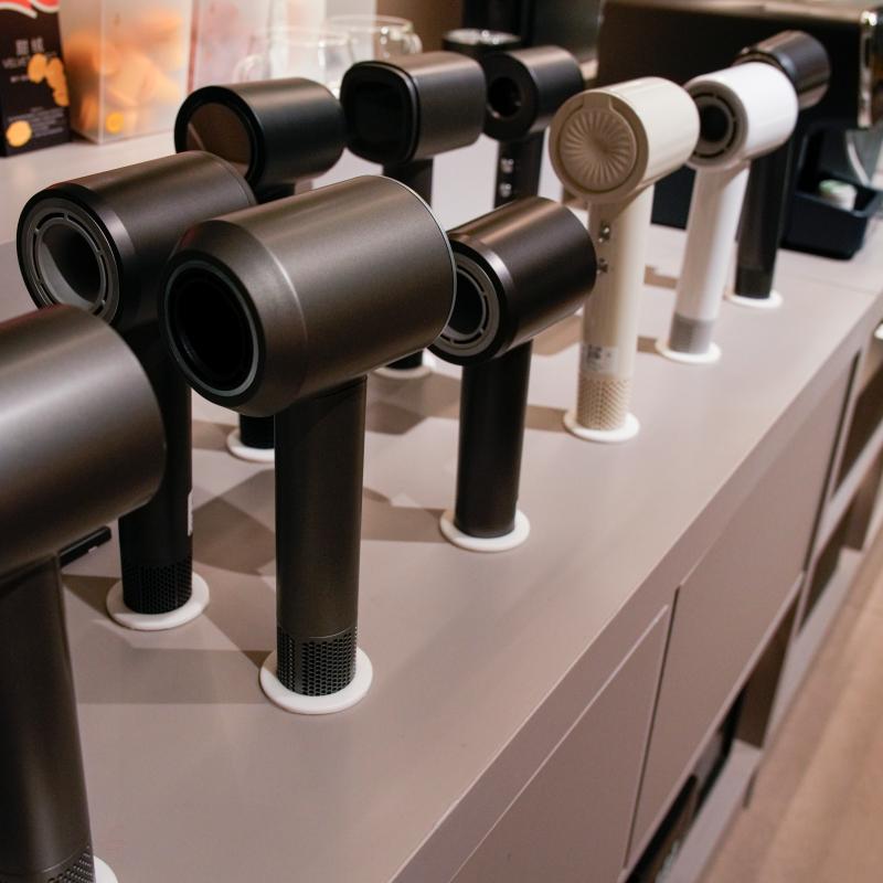 Modern high-speed hotel hair dryers with quiet BLDC motors displayed for B2B procurement by Taitang.JPG
