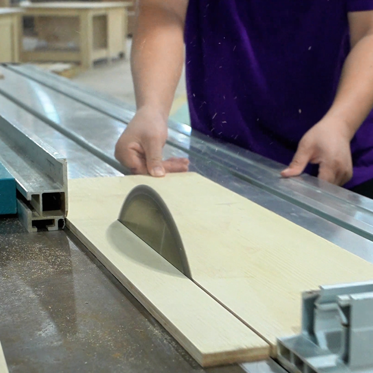 Precision wood sawing and material processing for commercial-grade hotel table bases.png