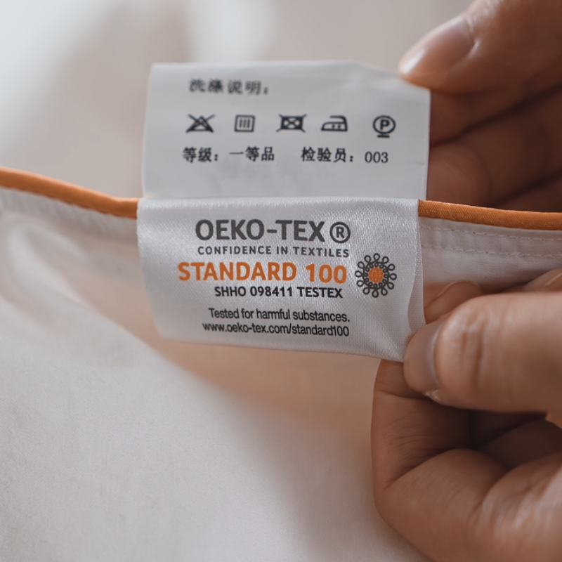 OEKO-TEX Standard 100 eco-certification fabric label on Taitang commercial hotel bedding.png