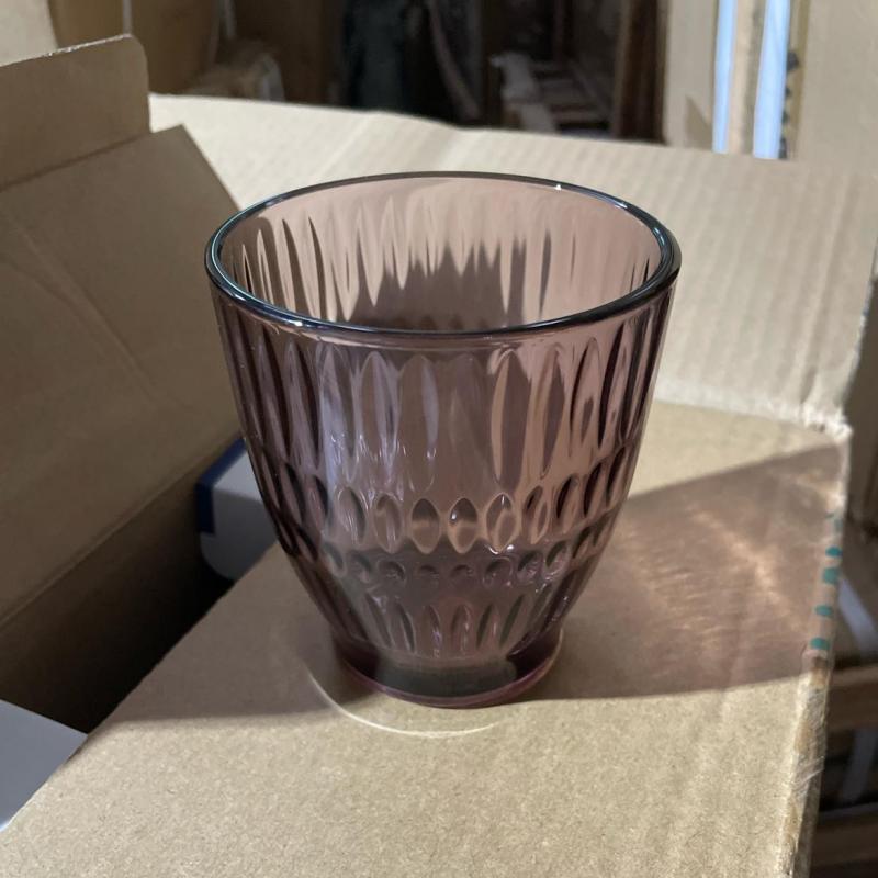 Commercial ribbed purple glass water tumbler undergoing factory pre-shipment quality inspection.JPG