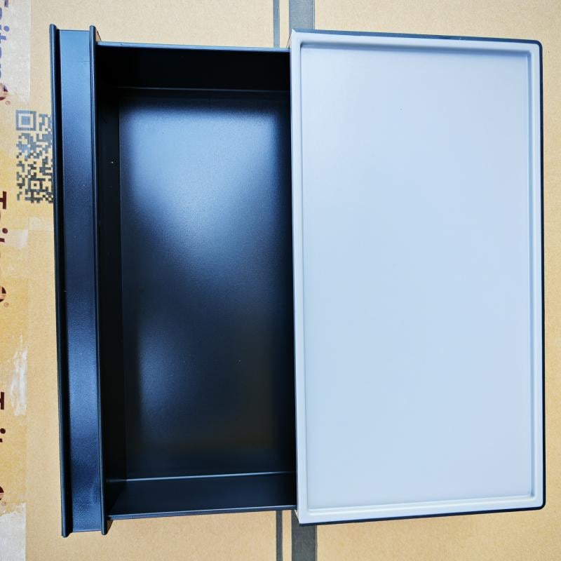 Sleek black and white commercial hotel room amenity organizer box with open compartment.jpg