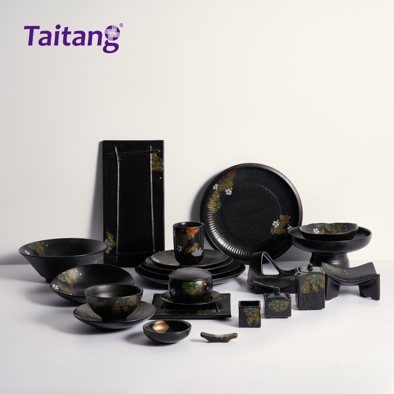 1. Taitang brand full collection display of black porcelain dinnerware with intricate gold and red leaf patterns, suitable for upscale Asian fusion dining.jpg