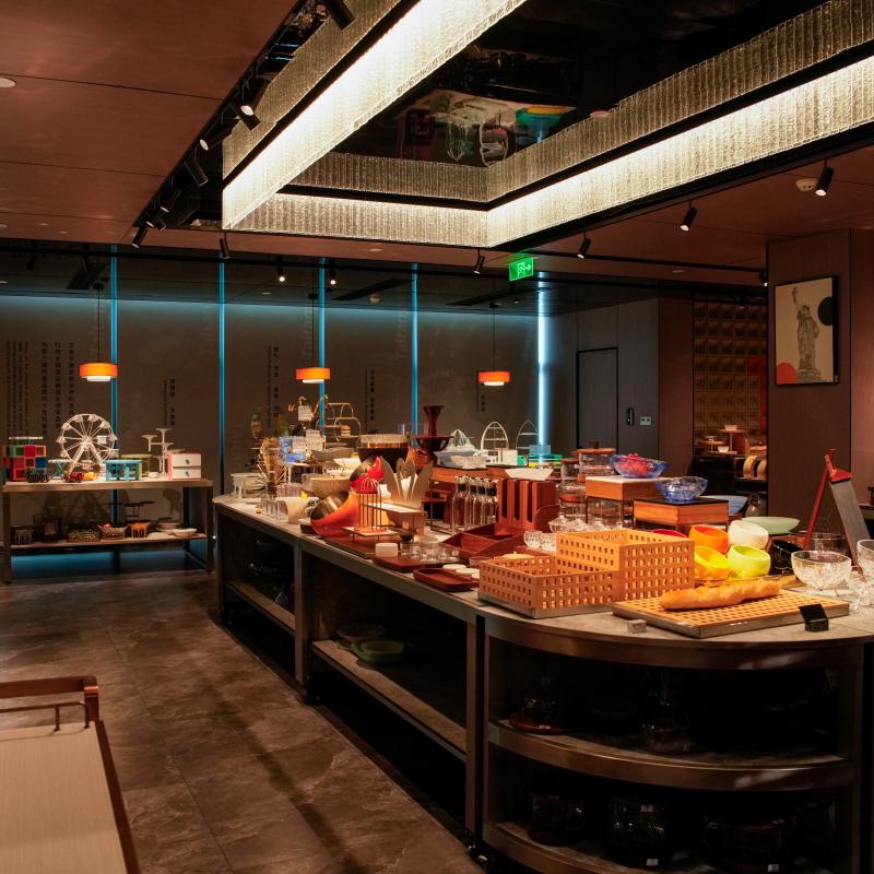 An extensive view showcasing multiple connected buffet serving counters from Taitang, demonstrating a large-scale commercial foodservice installation in a showroom environment for HoReCa clients.JPG