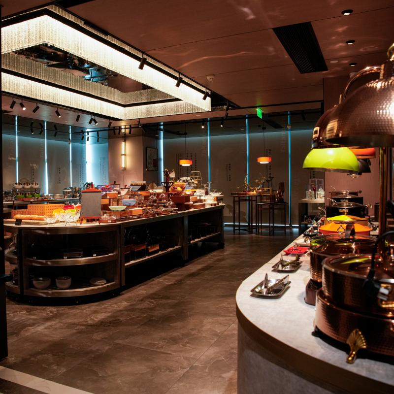 Commercial hotel buffet station featuring stainless steel chafing dishes and catering equipment in Taitang showroom.JPG