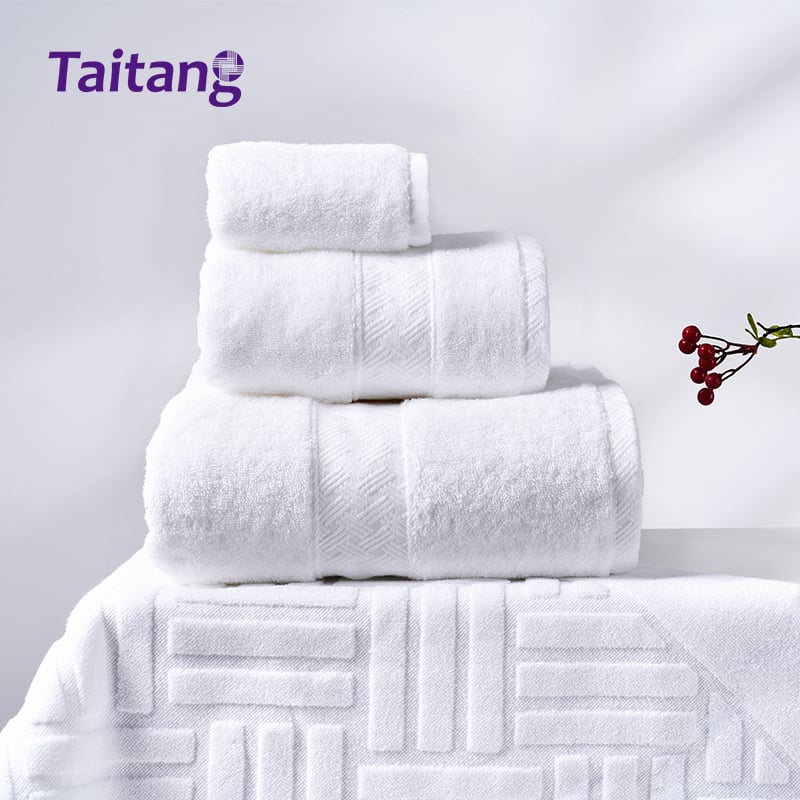 Taitang luxury white cotton hotel towel collection with mesh grid dobby header.jpg