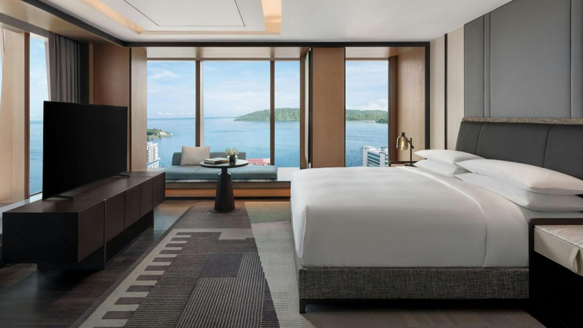 Taitang custom hotel guest room supplies and luxury bedding setup at ocean view Sheraton hotel suite.jpg