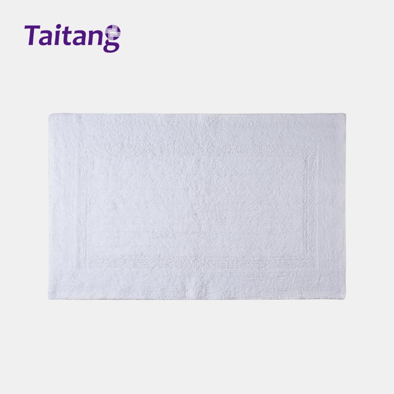 Oq mehmonxona bath mat va spa bath rug 1100 g og'irlikdagi mo'tabar paxta, elegan chegarali dizayn bilan