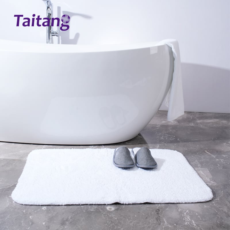 Oq mehmonxona bath mat va spa bath rug 1100 g og'irlikdagi mo'tabar paxta, elegan chegarali dizayn bilan